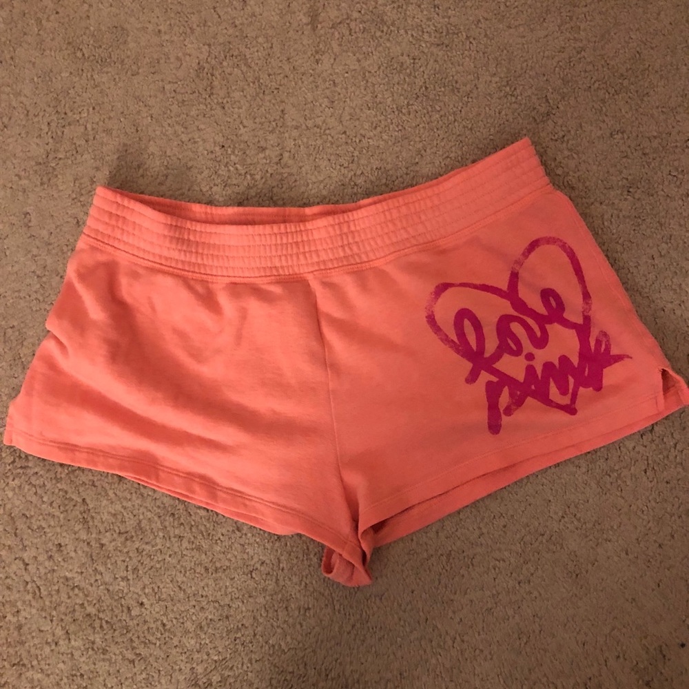 Orange shorts pink brand